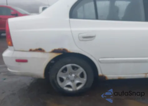 2003 Hyundai Accent Gl z USA, uszkodzony, nr VIN KMHCG45C93U486769